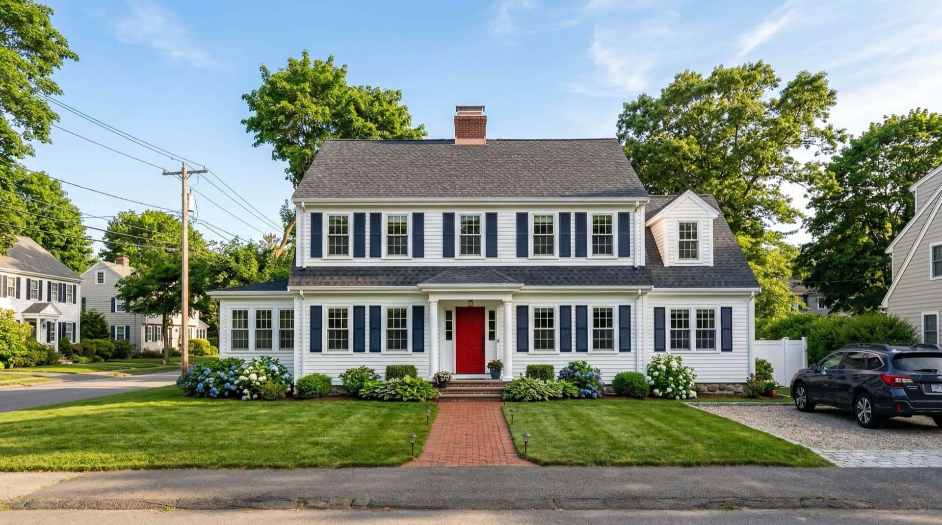 Suburban Massachusetts Colonial home with new architectural shingle roof
